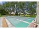 Enjoy a match on the shuffleboard courts amid mature shade trees and lush landscaping at 2537 Oakleaf Ln # 32A, Clearwater, FL 33763