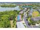 Panoramic aerial shot of the community featuring beautiful landscaping, scenic lake, and well-maintained properties at 2547 Lexington Oak Dr, Brandon, FL 33511