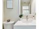 Bright bathroom featuring white sink, faucet, and modern decorations at 2547 Lexington Oak Dr, Brandon, FL 33511