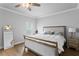 Bright and airy bedroom with wood floors, a ceiling fan, and neutral décor at 2708 W North B St # 3, Tampa, FL 33609