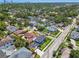 Charming neighborhood with green trees; features a two-story home with a beautifully landscaped yard at 3008 S Church Ave, Tampa, FL 33629