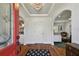 Elegant foyer with hardwood floors, chandelier, and views into the living spaces at 3008 S Church Ave, Tampa, FL 33629