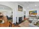 Stylish living room with hardwood floors, fireplace, and open archways to adjacent spaces at 3008 S Church Ave, Tampa, FL 33629
