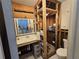Bathroom with a sink, mirror, toilet, and shower at 315 Shore E Dr, Oldsmar, FL 34677