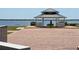 A gazebo overlooks a serene body of water in a scenic park setting at 315 Shore E Dr, Oldsmar, FL 34677