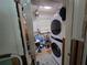 The laundry room features a stacked washer/dryer and a window for ventilation at 315 Shore E Dr, Oldsmar, FL 34677