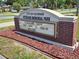 The sign for Veteran's Memorial Park shows an upcoming hurricane expo at 315 Shore E Dr, Oldsmar, FL 34677