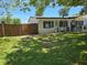 This property includes a spacious, fenced side yard perfect for outdoor activities or privacy at 315 Shore E Dr, Oldsmar, FL 34677