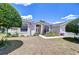 Inviting single-story home featuring a well-manicured lawn and charming curb appeal at 316 Crystal Goblet Ct, Valrico, FL 33594