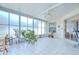 Bright sunroom with tile floors, plants and plenty of natural light at 316 Crystal Goblet Ct, Valrico, FL 33594