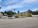 Palma Ceia Gardens Condominiums exterior shot showing building and parking at 3206 W Azeele St # 108, Tampa, FL 33609
