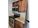 Updated kitchen features stainless steel appliances and granite countertops at 3206 W Azeele St # 108, Tampa, FL 33609
