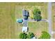 Home features metal roofed outbuilding, a dark roofed house and a long driveway on a large lot of land at 3434 E Keysville Rd, Lithia, FL 33547