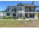Charming two-story home featuring a balcony, bay windows, and a well-maintained front yard at 3434 E Keysville Rd, Lithia, FL 33547