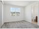 Bright bedroom featuring a window and access to the en suite bathroom at 3488 Great Banyan Way, Wesley Chapel, FL 33543