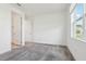 A well-lit bedroom featuring neutral walls, plush carpeting, and a closet at 3488 Great Banyan Way, Wesley Chapel, FL 33543