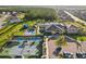 Aerial view of community center with pool, tennis and basketball courts at 3488 Great Banyan Way, Wesley Chapel, FL 33543