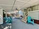 Covered patio featuring painted wood, hammock, and lounge chairs at 4202 N Suwanee Ave, Tampa, FL 33603
