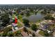 Aerial view of a property with a pool in a quiet suburban neighborhood at 4421 28Th N Ave, St Petersburg, FL 33713