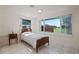 Cozy bedroom with water view, vintage furniture and tile floors at 4421 28Th N Ave, St Petersburg, FL 33713