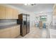 Bright kitchen with stainless steel appliances, light cabinets, and a breakfast nook with water views at 4421 28Th N Ave, St Petersburg, FL 33713
