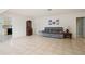 Open living room with tile flooring, comfortable seating, and classic decor at 4421 28Th N Ave, St Petersburg, FL 33713