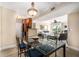 Open floor plan with the kitchen and dining room adjacent to the living room with sliding door to the outside at 455 Alt 19 S # 65, Palm Harbor, FL 34683