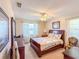 Comfortable bedroom with natural lighting at 503 Finsbury Cir # A, Sun City Center, FL 33573