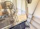 View of a golf cart for sale in a sunroom with price tag visible at 503 Finsbury Cir # A, Sun City Center, FL 33573