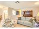 Inviting living room features neutral colors and comfortable seating at 503 Finsbury Cir # A, Sun City Center, FL 33573