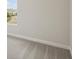 Bedroom featuring a double hung window offering natural light and neutral carpet at 5194 Everlong Dr, Apollo Beach, FL 33572