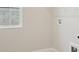 Bright laundry room with window, utility connections, and ample space for chores at 5194 Everlong Dr, Apollo Beach, FL 33572