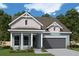 Charming single-Gathering home with professionally landscaped front yard and attached two-car garage at 5287 Everlong Dr, Apollo Beach, FL 33572