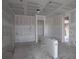 Unfinished living room featuring door frames ready for finishes at 5287 Everlong Dr, Apollo Beach, FL 33572