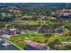 Stunning aerial view of the golf course, tennis courts, marina, and residential area at 5939 Bayview S Cir, Gulfport, FL 33707