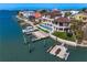 Waterfront home with a private boat dock, pool, and beautifully landscaped backyard at 5939 Bayview S Cir, Gulfport, FL 33707