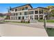 Expansive backyard with patio seating, a dock and manicured lawn with waterfront access at 5939 Bayview S Cir, Gulfport, FL 33707