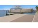Dock with a boat lift and a power boat on the water at 5939 Bayview S Cir, Gulfport, FL 33707