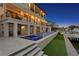 Multi-story waterfront estate with several balconies, a pool, jacuzzi, and boat lift at 5939 Bayview S Cir, Gulfport, FL 33707