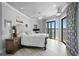 Spacious main bedroom with access to a balcony with beautiful water views at 5939 Bayview S Cir, Gulfport, FL 33707