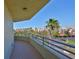 Spacious balcony offering serene views of the community's landscape and nearby amenities at 7882 Sailboat Key S Blvd # 401, South Pasadena, FL 33707
