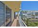 Relaxing balcony featuring views of the neighborhood and the water, ideal for outdoor living and enjoying scenic vistas at 7882 Sailboat Key S Blvd # 401, South Pasadena, FL 33707