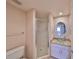Clean bathroom with glass enclosed shower, vessel sink, and updated fixtures, providing a modern and functional space at 7882 Sailboat Key S Blvd # 401, South Pasadena, FL 33707