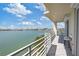 Balcony view overlooking peaceful water, waterfront homes, and gorgeous Florida skies at 7912 Sailboat Key S Blvd # 508, South Pasadena, FL 33707