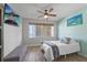 Cozy bedroom with a comfortable bed, ceiling fan, and relaxing ambiance at 7912 Sailboat Key S Blvd # 508, South Pasadena, FL 33707