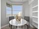 Bright dining area with waterfront views, contemporary furniture, and modern shelving at 7912 Sailboat Key S Blvd # 508, South Pasadena, FL 33707