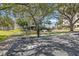 Community exterior with EV charging stations, landscaping, and waterfront access at 7912 Sailboat Key S Blvd # 508, South Pasadena, FL 33707