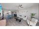 Bright living room with modern decor, ceiling fan, and gray flooring at 7912 Sailboat Key S Blvd # 508, South Pasadena, FL 33707