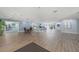 Spacious lobby area with comfortable seating, hardwood floors, and ample lighting at 7912 Sailboat Key S Blvd # 508, South Pasadena, FL 33707