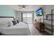 Comfortable main bedroom featuring a waterfront balcony and stylish furniture at 7912 Sailboat Key S Blvd # 508, South Pasadena, FL 33707